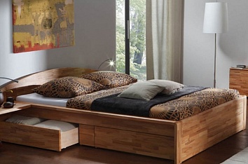 Практичность и комфортность двуспальной кровати с выдвижными ящиками